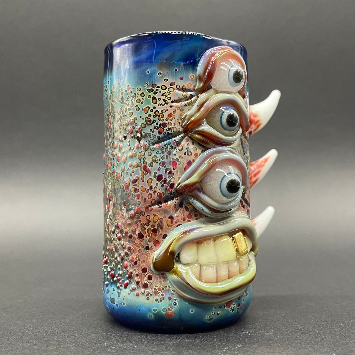 Vertical 3 eye shot glass by Leviathan Glass - artisan detail