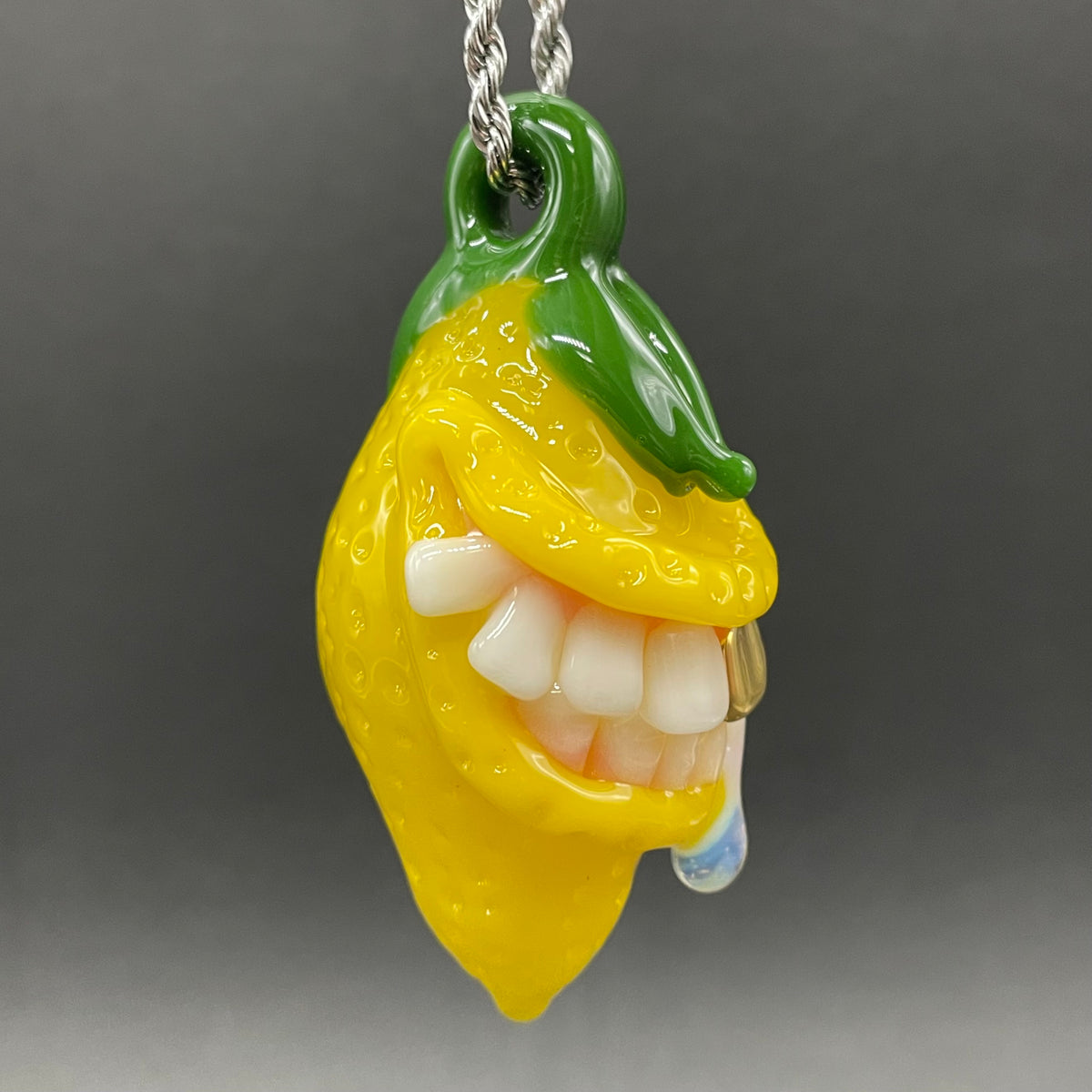 Grinning lemon pendant