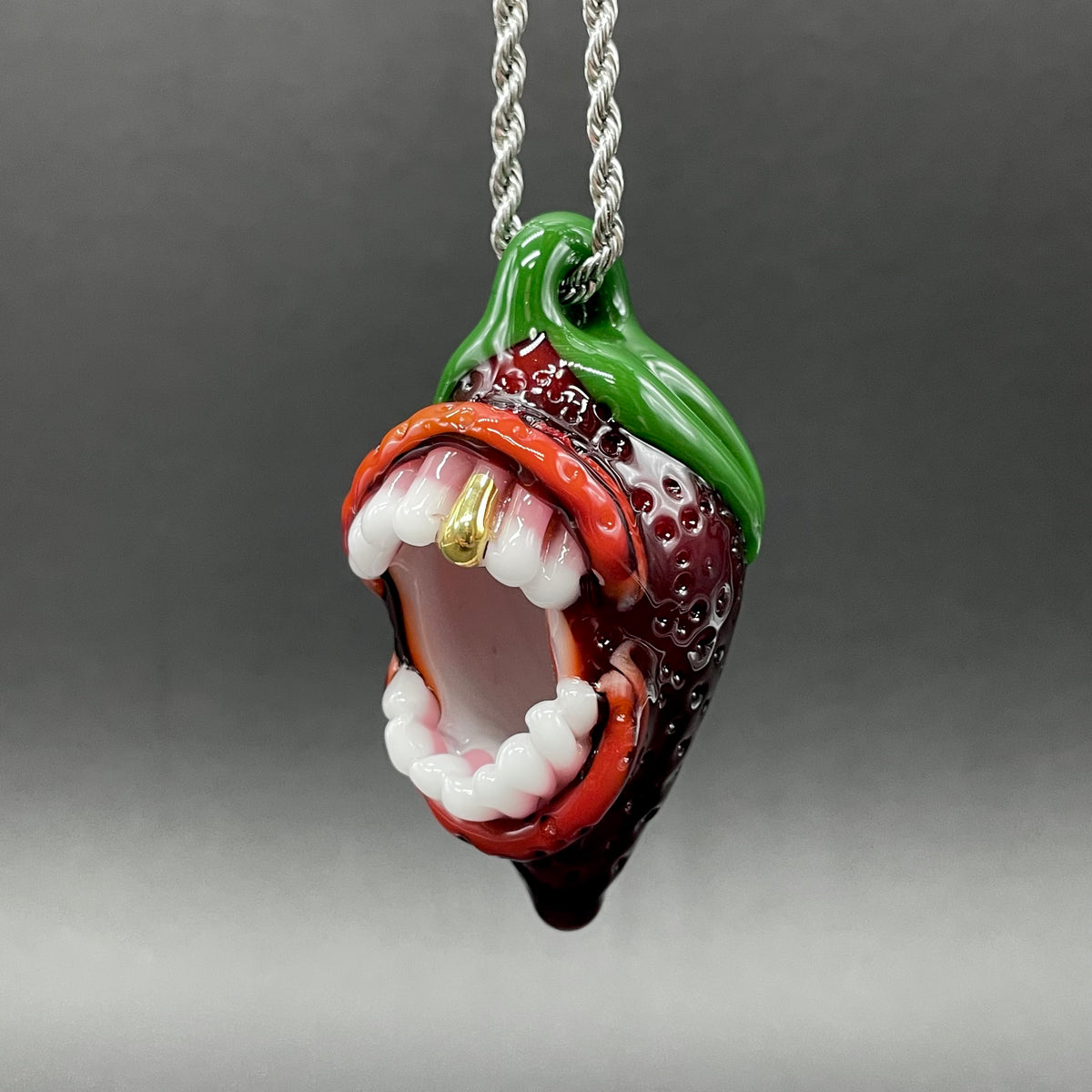 Screaming strawberry glass pendant
