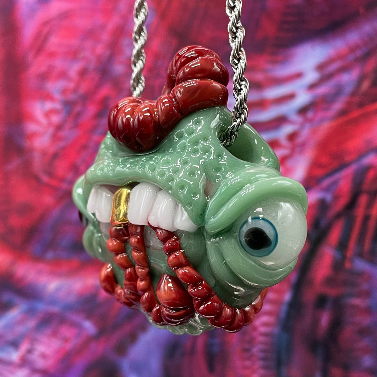Worm eater pendant