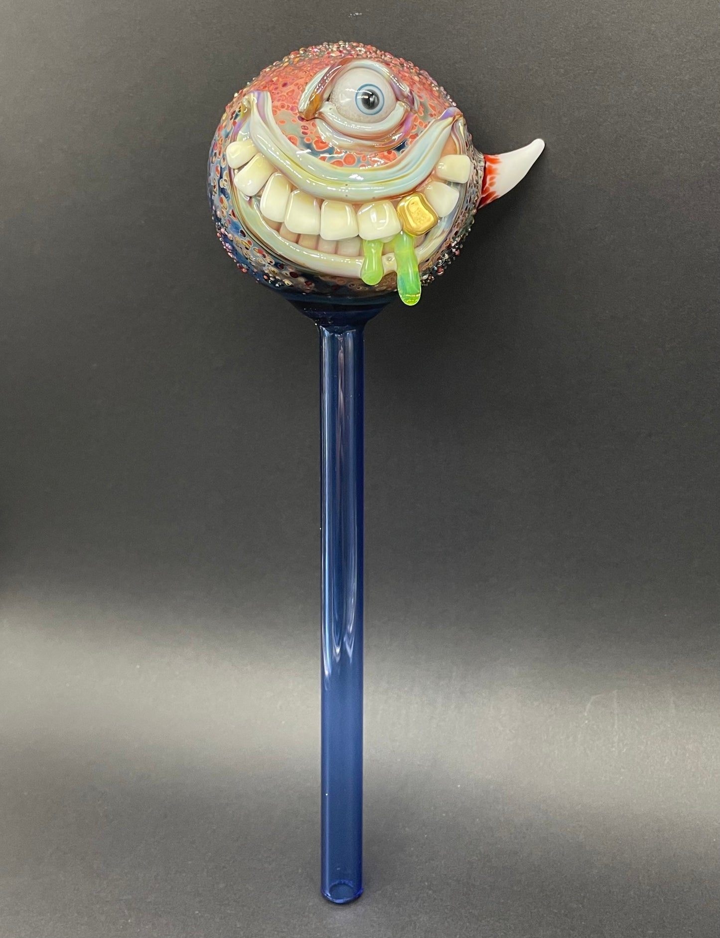 Hand blown glass monster watering globe