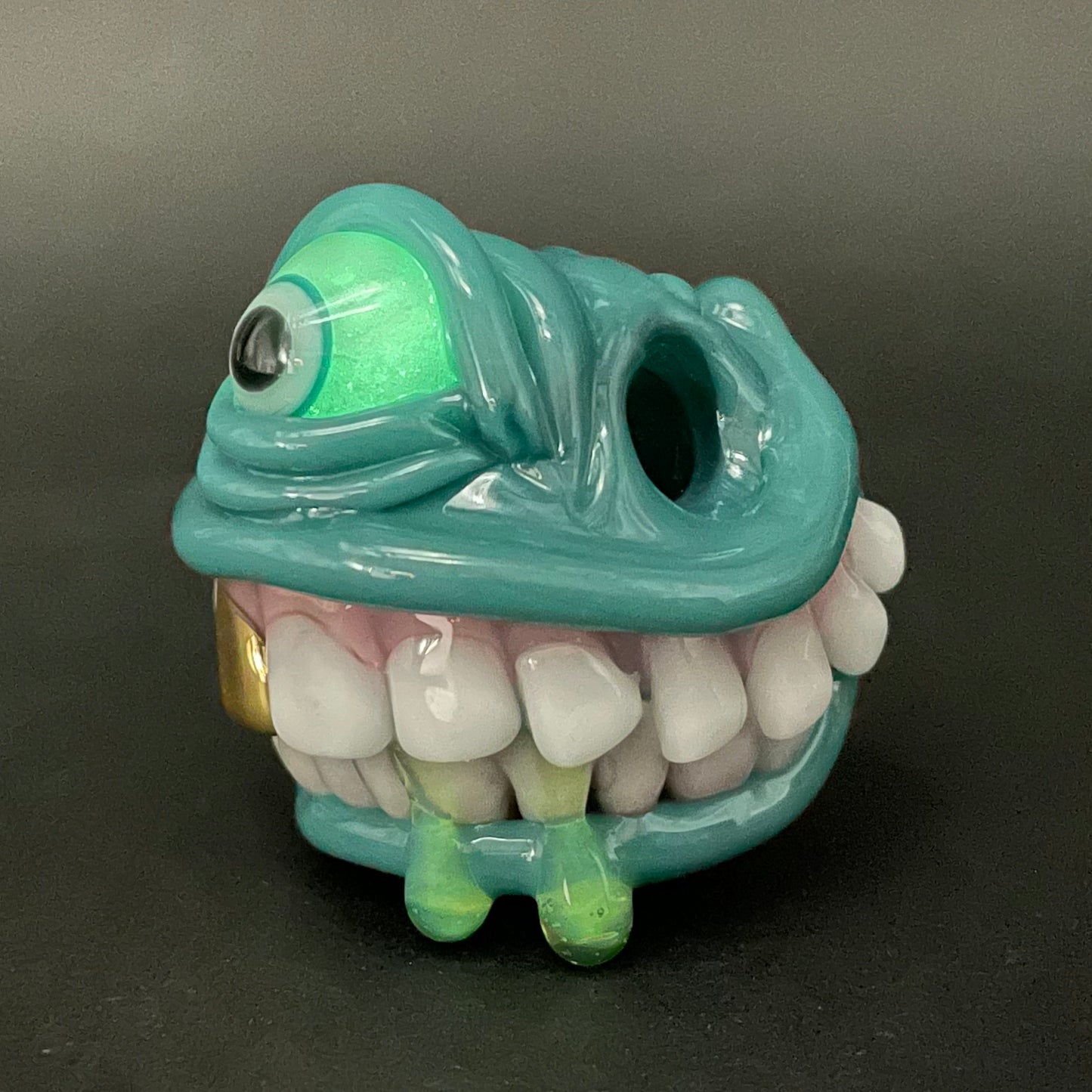 Grinning like a fool glass pendant