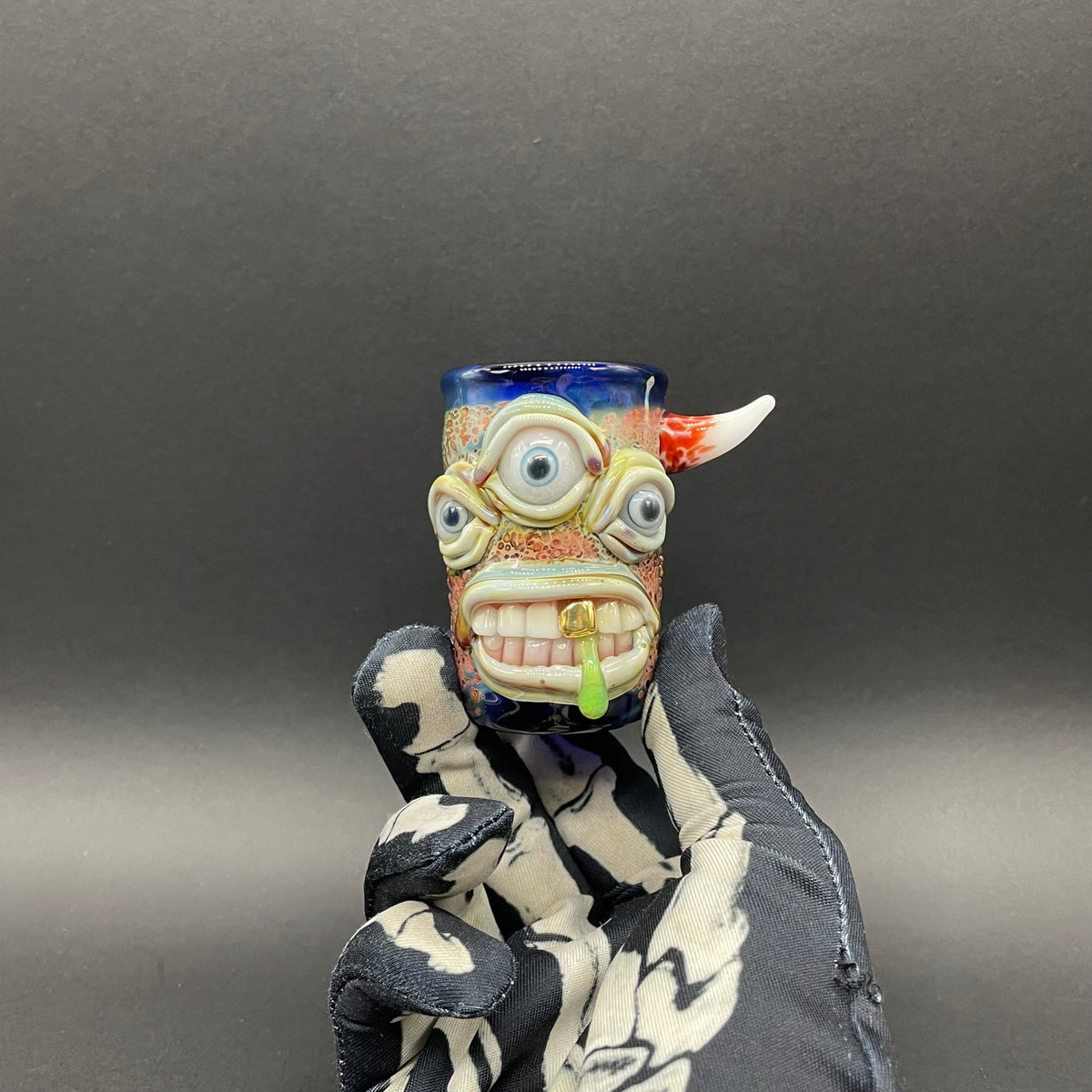 Triclops shot glass detail view - premium glass art