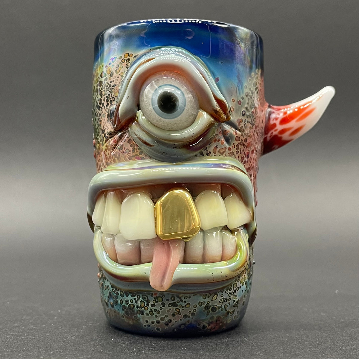Close-up of Cyclops shot glass - handcrafted glass