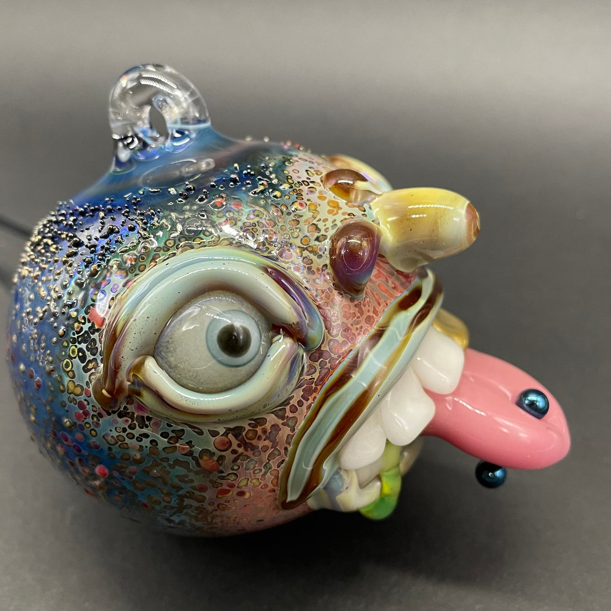 Pierced tongue cyclops ornament craftsmanship - artisan glass work