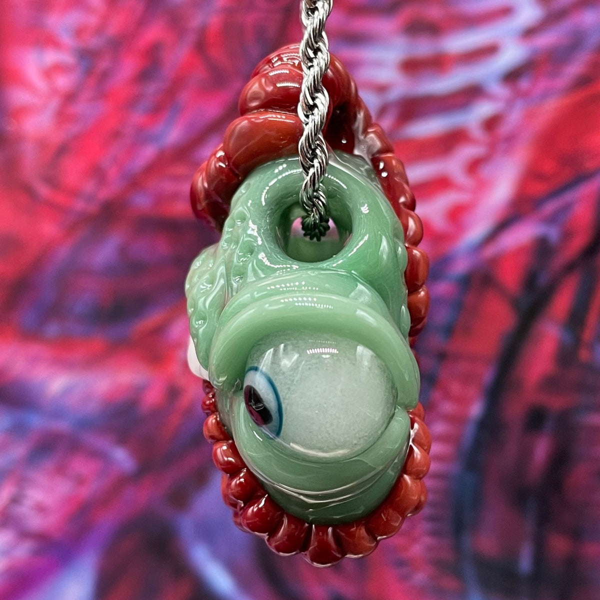 Worm eater pendant