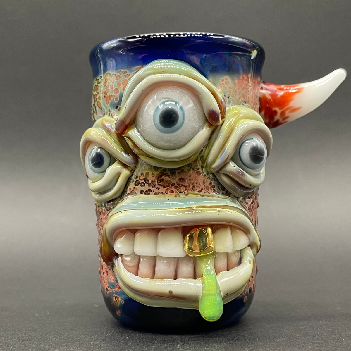 Triclops shot glass detail view - premium glass art