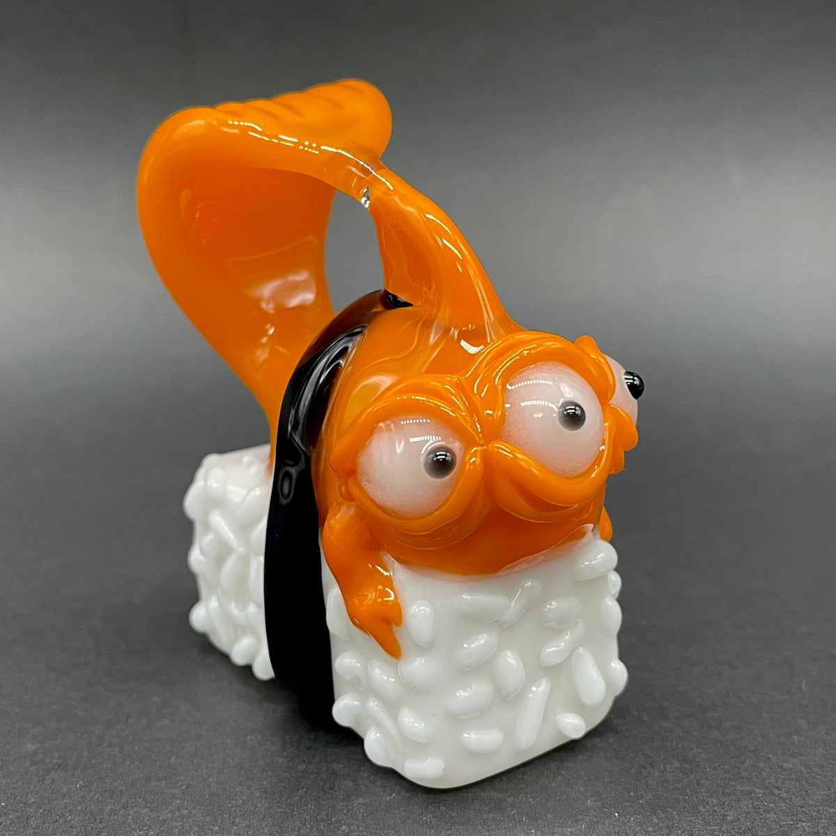 Mutant three eyed fish sushi glass pendant