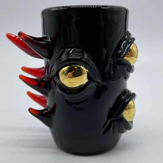 Onyx cyclops shot glass detail view - premium glass art