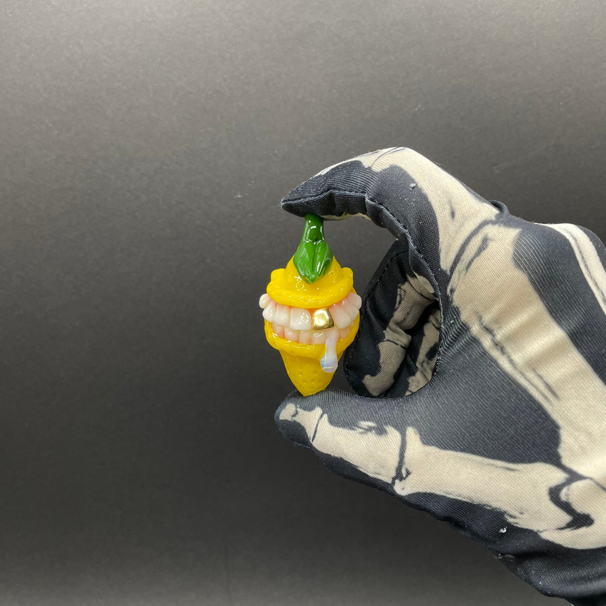 Grinning lemon pendant