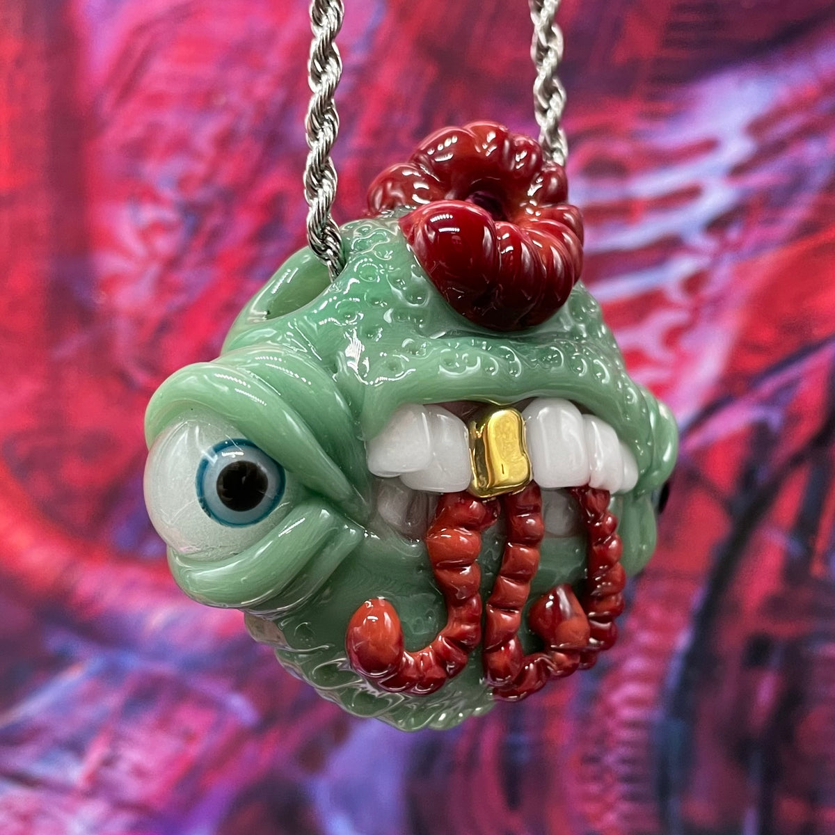 Worm eater pendant