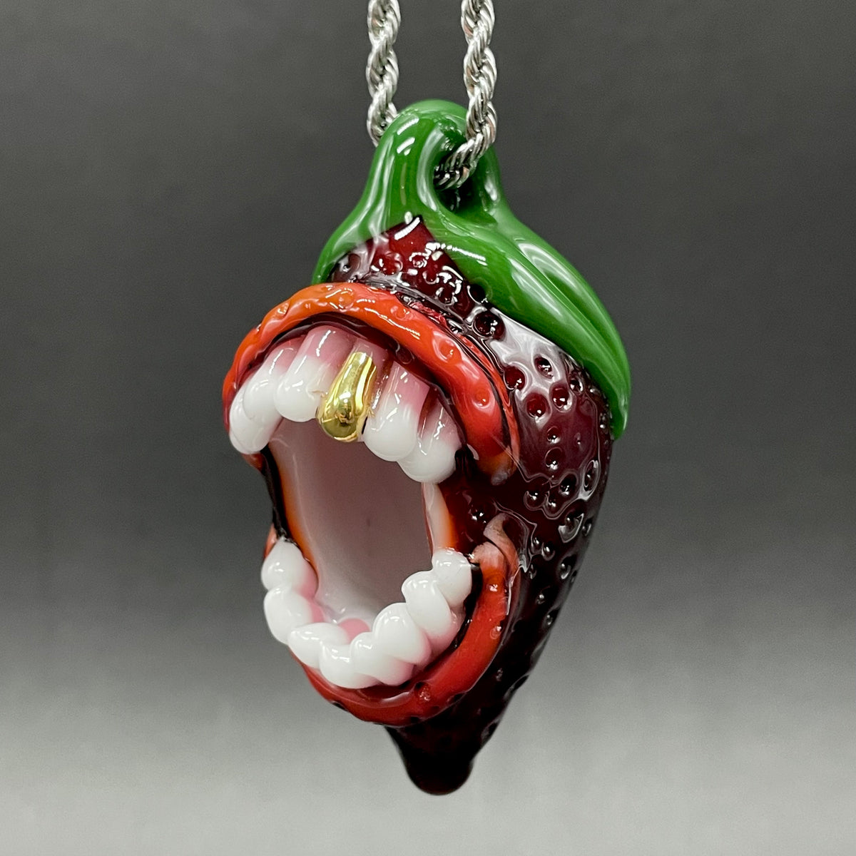 Screaming strawberry glass pendant