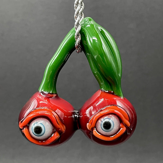 Cherry flavored glass eye pendant detail view - premium glass art