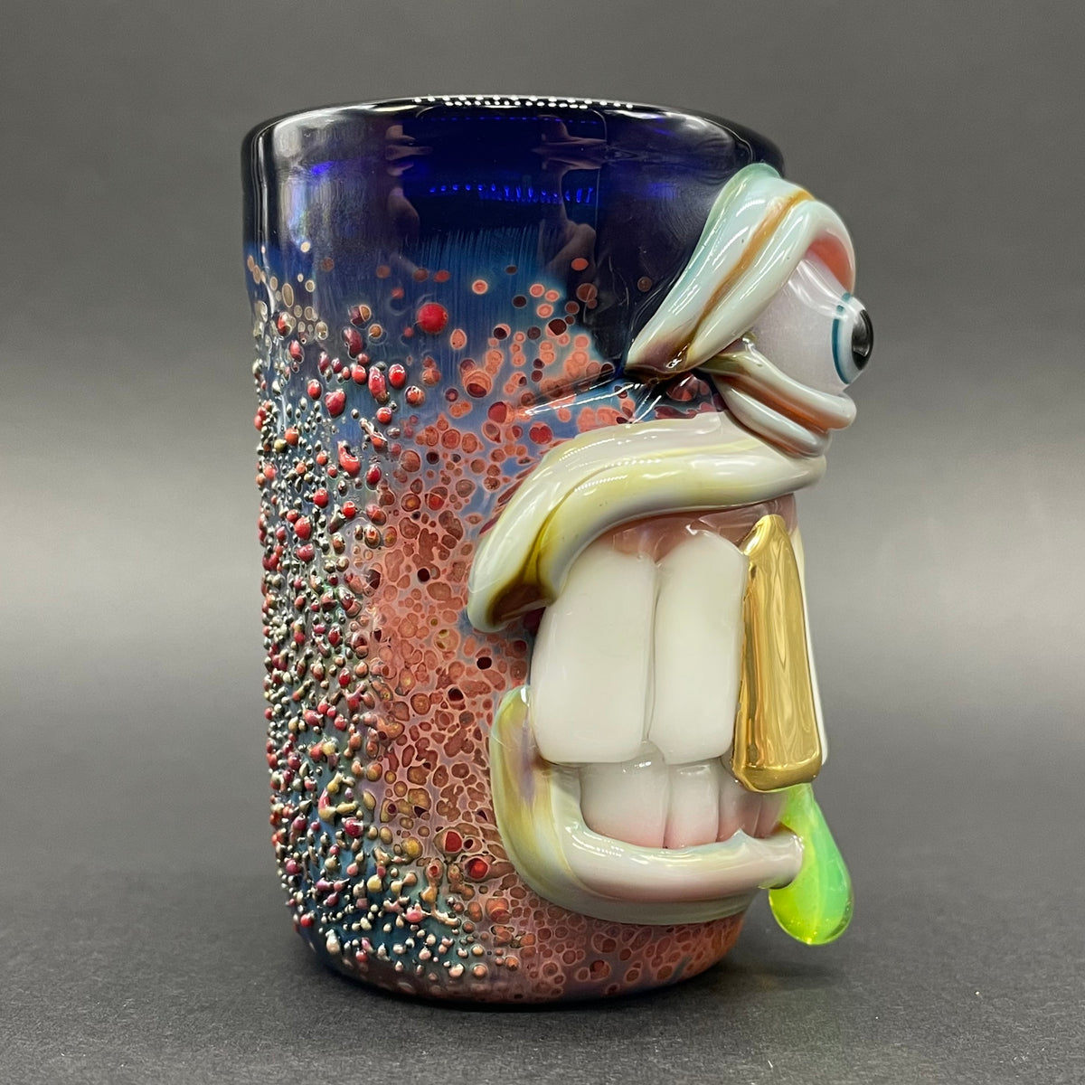 Big tooth Cyclops shot glass hand blown glass art - Leviathan Glass