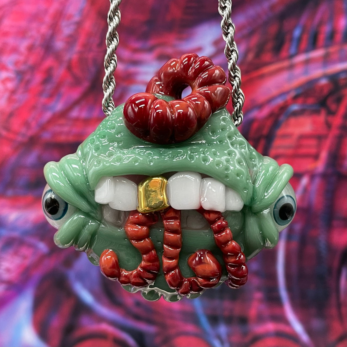 Worm eater pendant