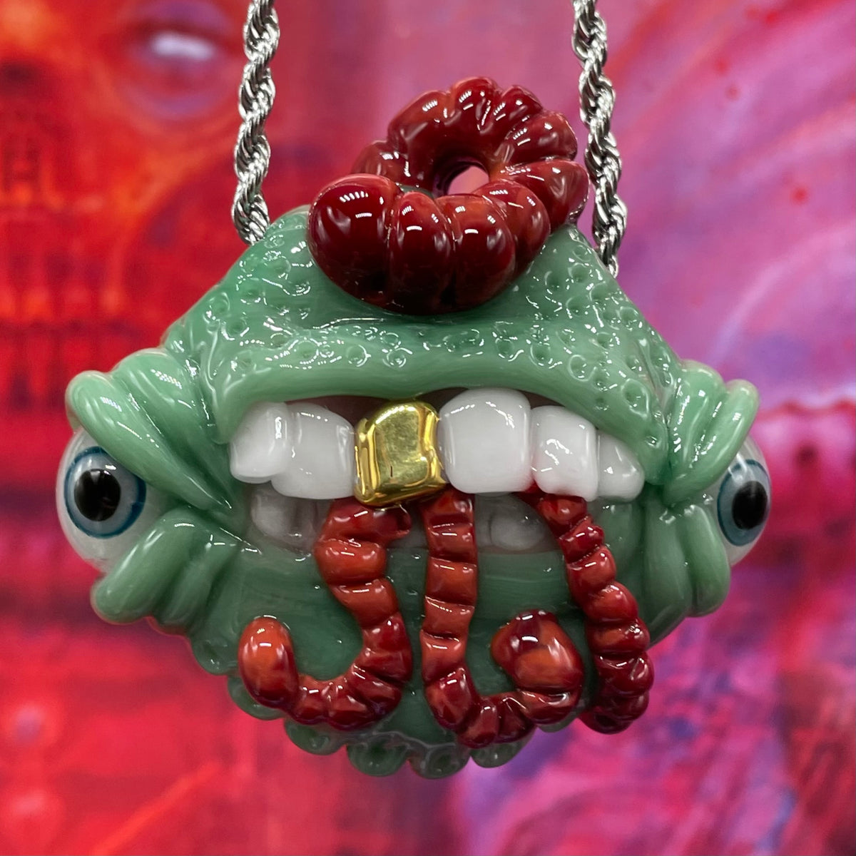 Worm eater pendant