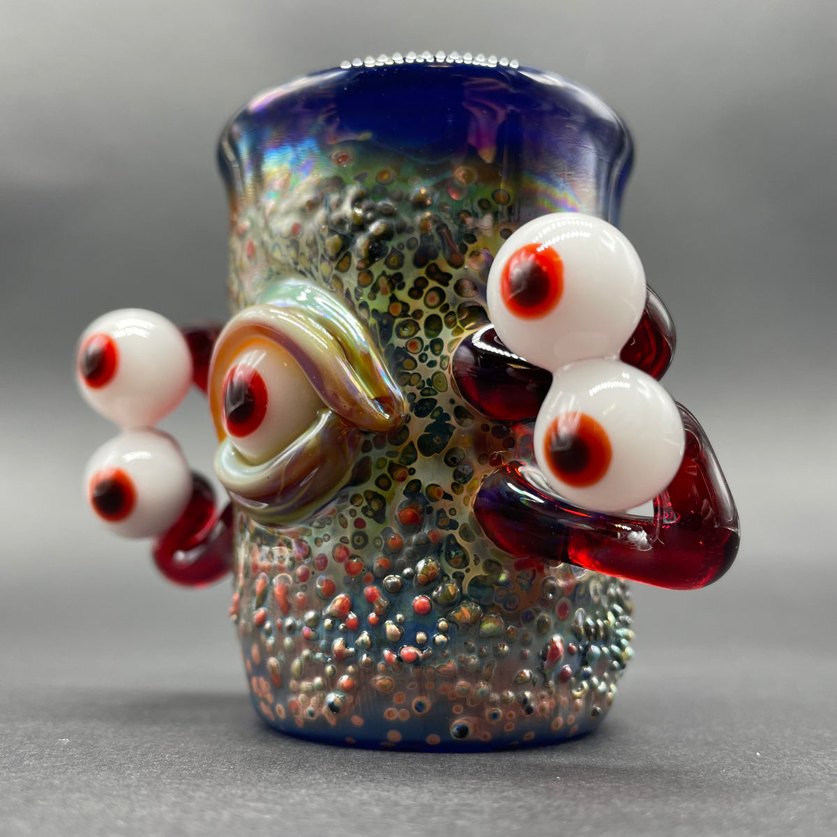 Close-up of Eyestalker shot glass - handcrafted glass