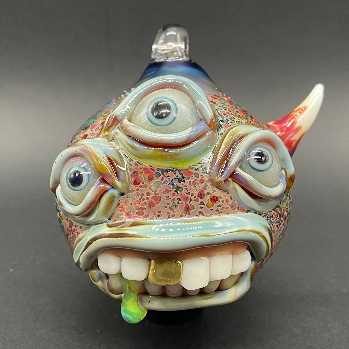 Triclops ornament detail view - premium glass art