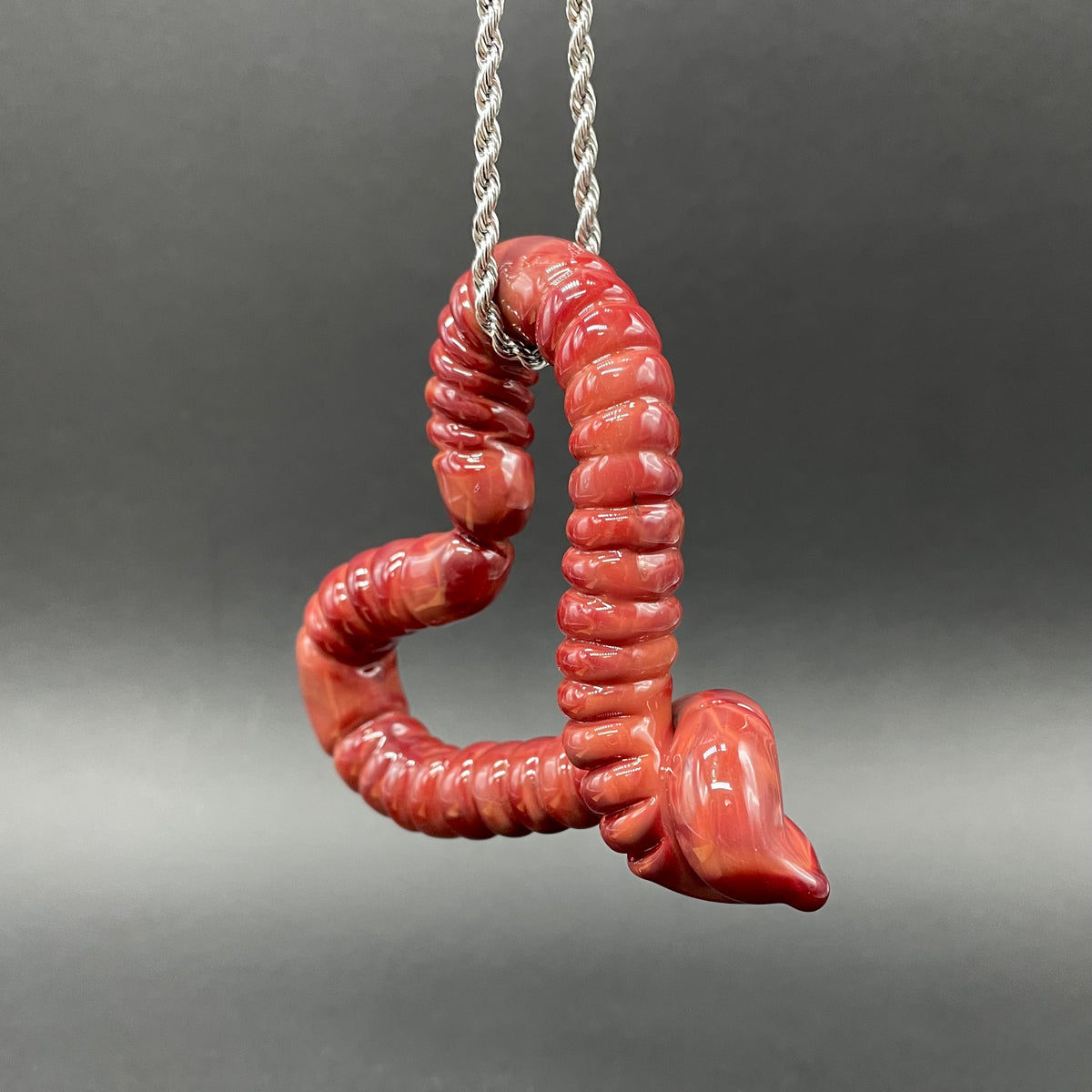 Large glass earthworm heart shaped pendant glass art - premium handcrafted piece