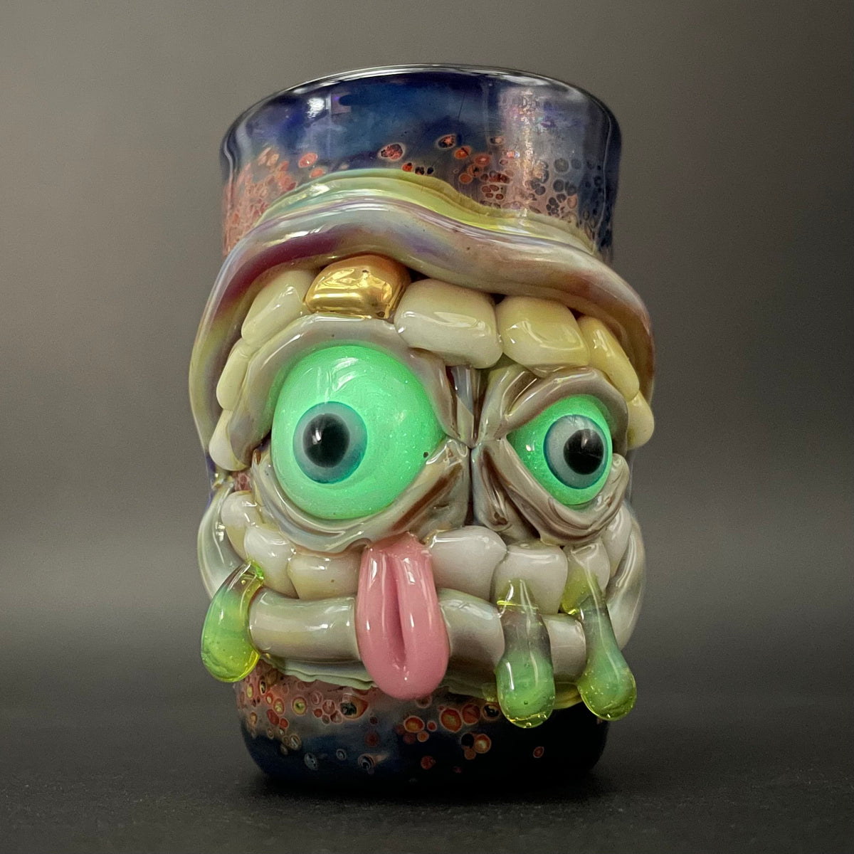 Close-up of Hungry eyes monster shot glass - handcrafted glass