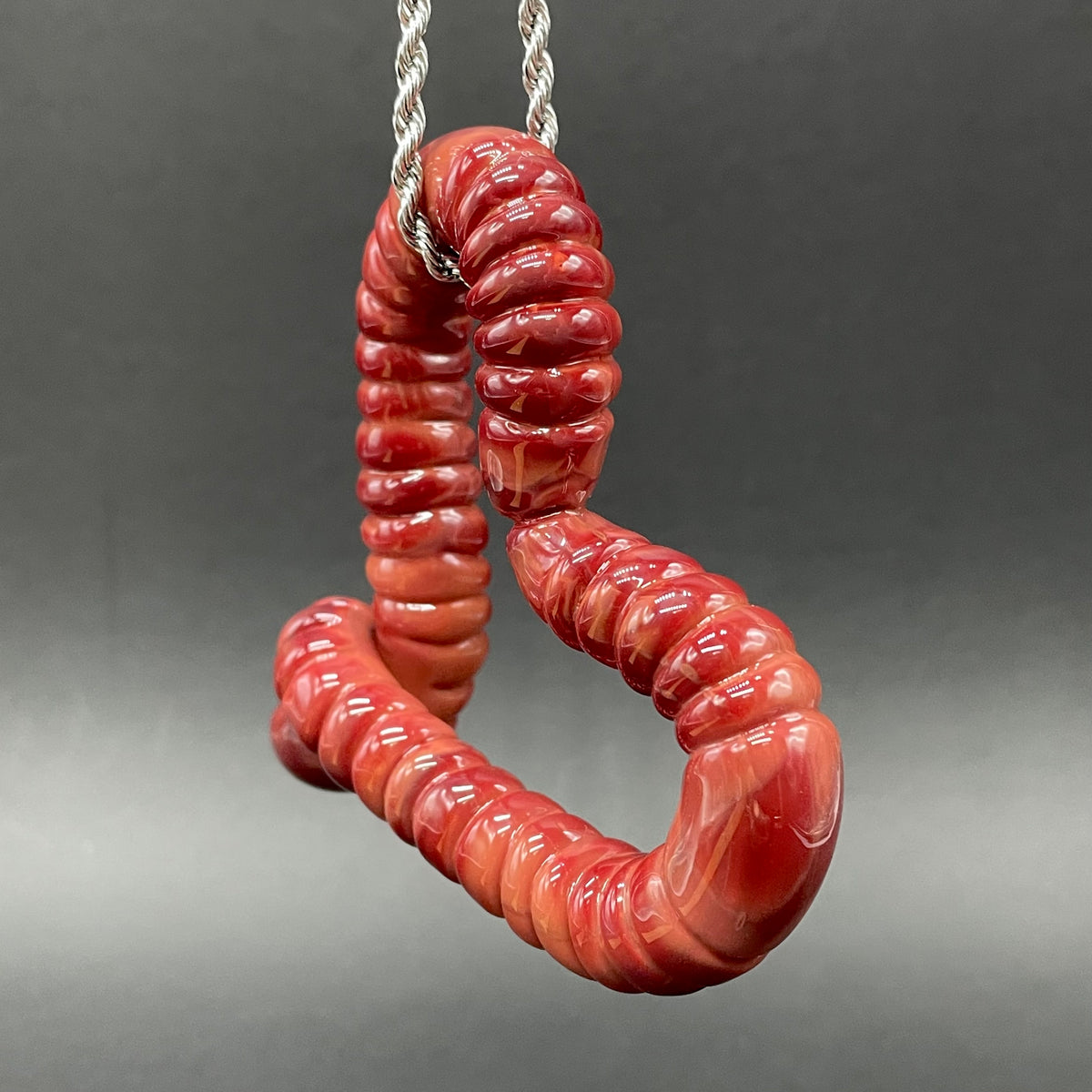 Premium Large glass earthworm heart shaped pendant - collectible glass art