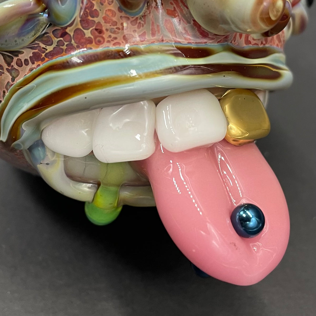 Pierced tongue cyclops ornament by Leviathan Glass - artisan detail