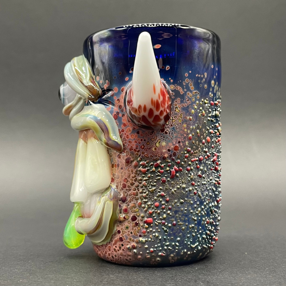 Big tooth Cyclops shot glass hand blown glass art - Leviathan Glass