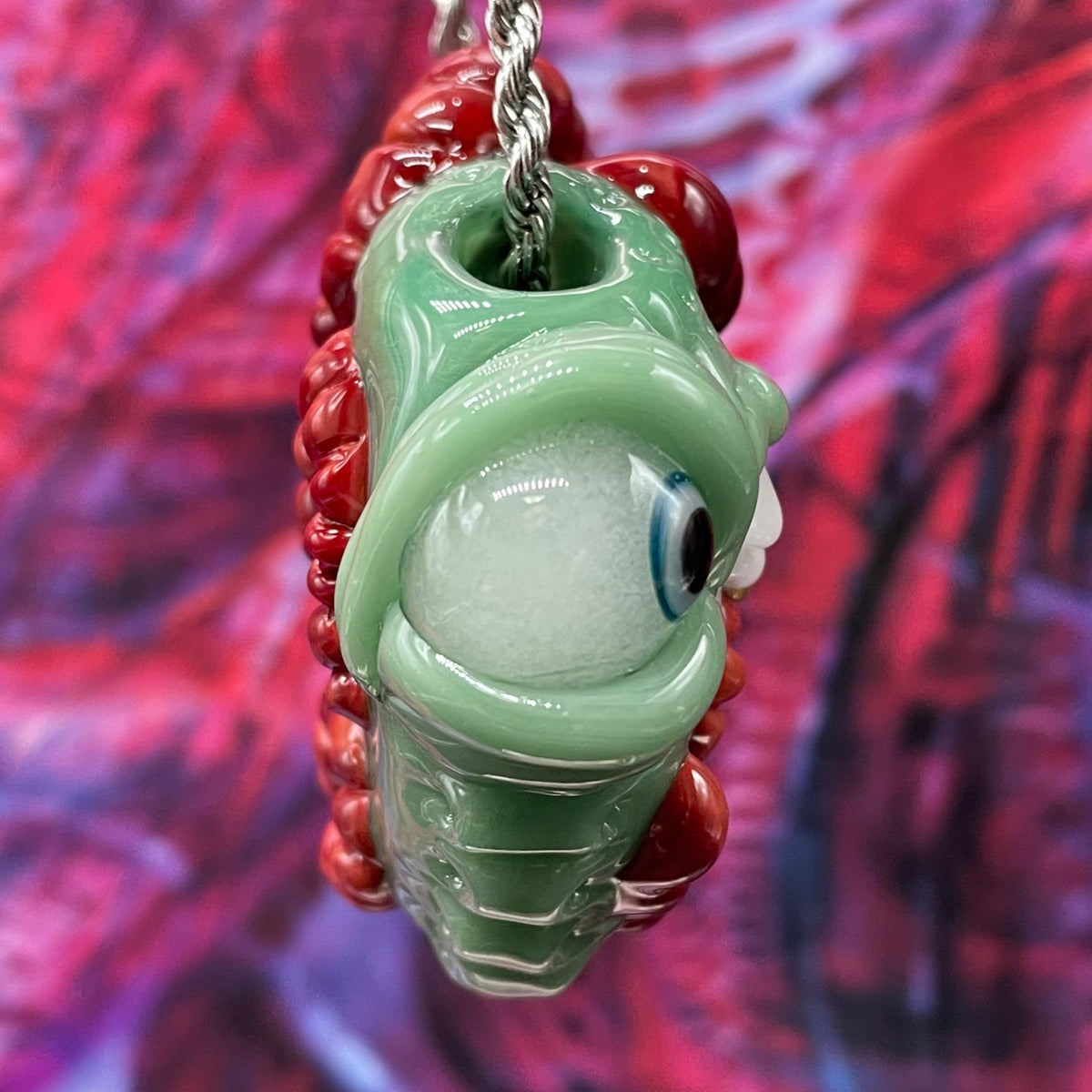 Worm eater pendant