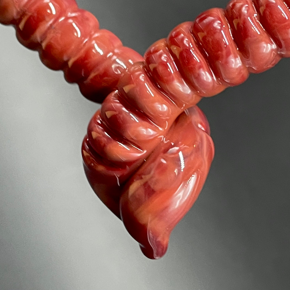 Hand-blown Large glass earthworm heart shaped pendant - Leviathan Glass original