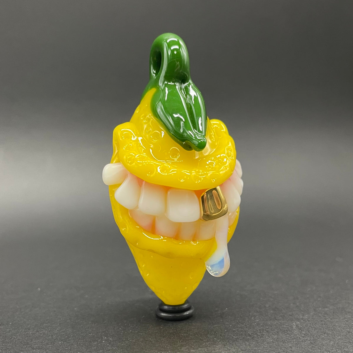 Grinning lemon pendant