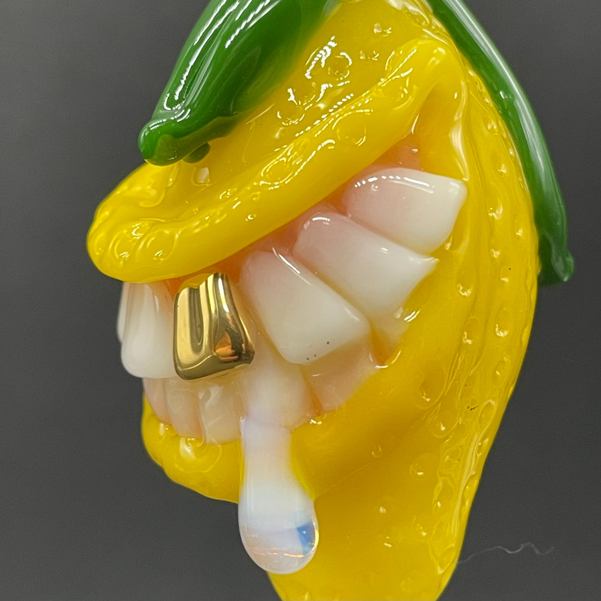 Grinning lemon pendant