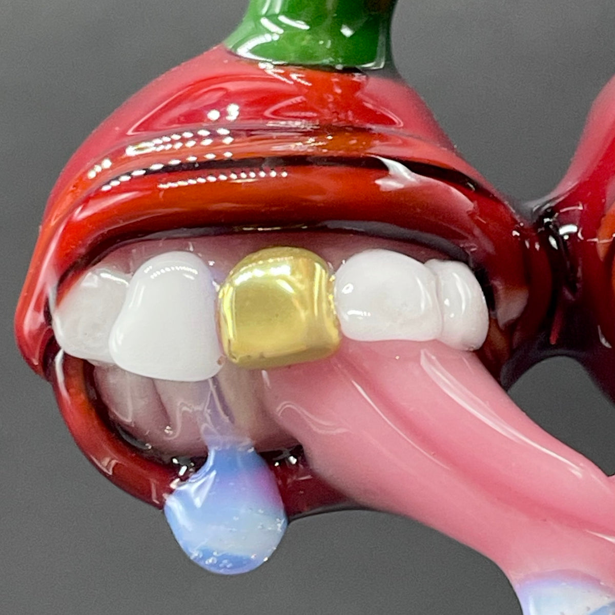 Cherry Lover handblown glass pendant - paired red cherries with green stem, each with open grinning mouth, white teeth, gold tooth, pink tongues, silver rope chain - Leviathan Glass
