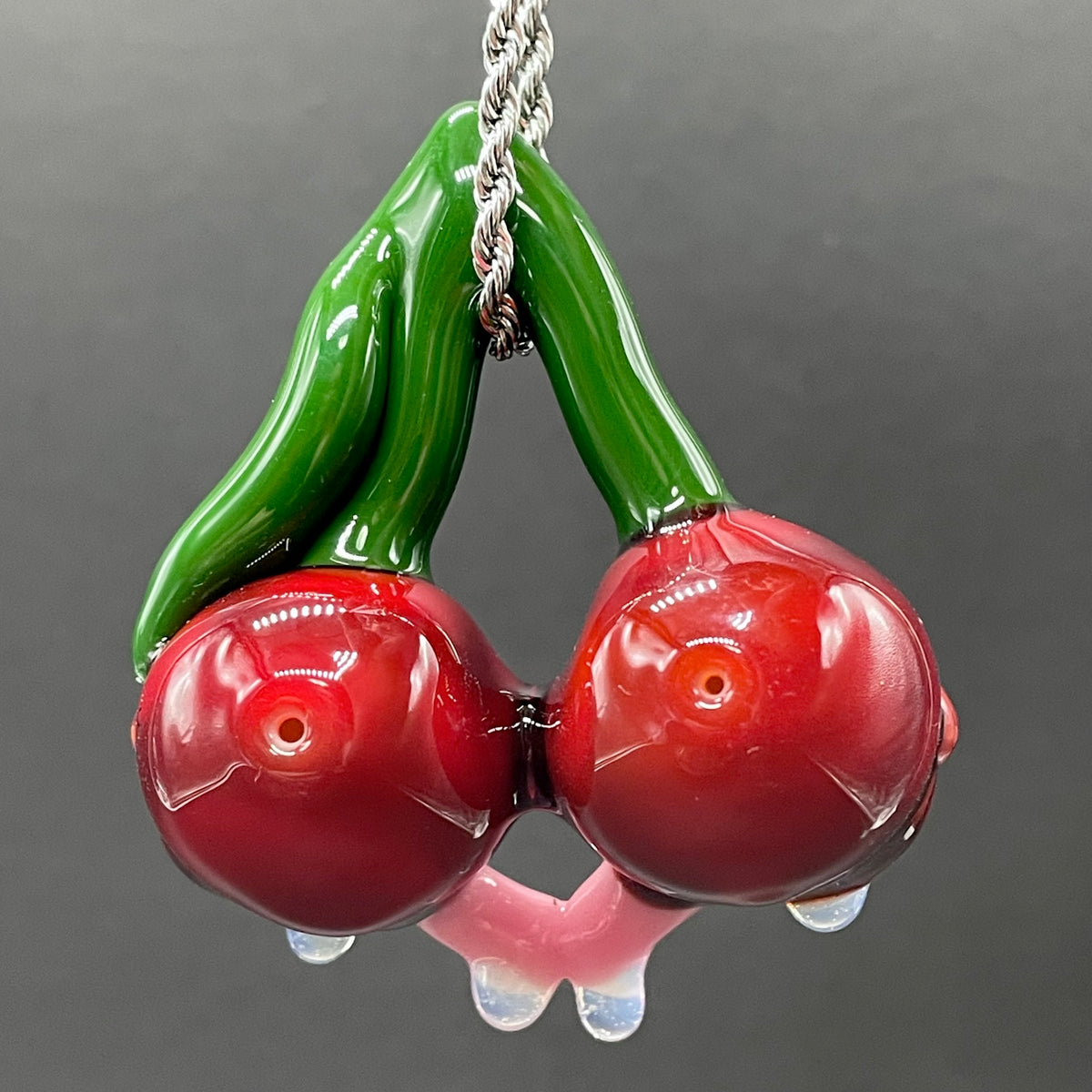 Cherry Lover handblown glass pendant - paired red cherries with green stem, each with open grinning mouth, white teeth, gold tooth, pink tongues, silver rope chain - Leviathan Glass
