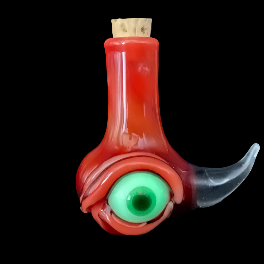 Red over white cyclops potion bottle detail view - premium glass art