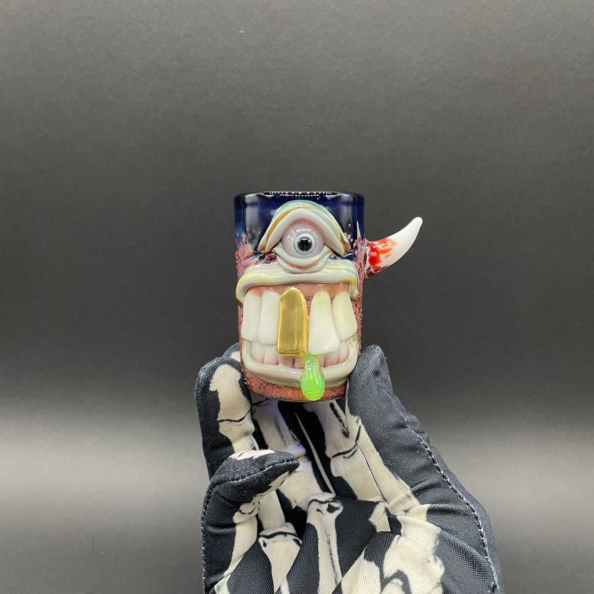 Big tooth Cyclops shot glass hand blown glass art - Leviathan Glass