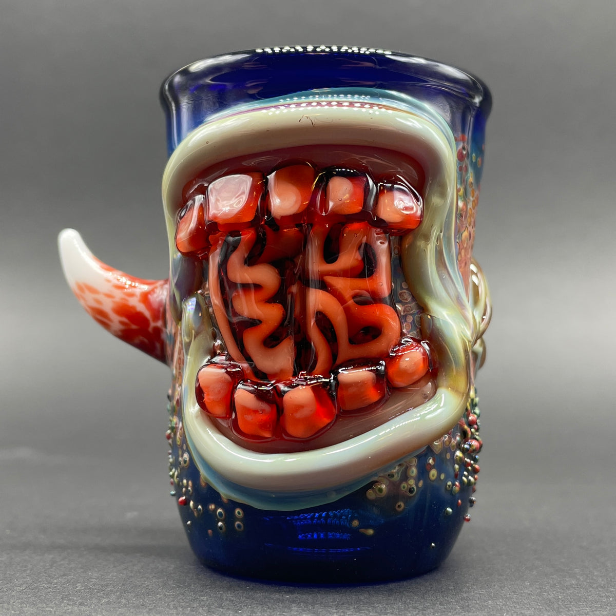 Close-up of Brain eating zombie shot glass - handcrafted glass
