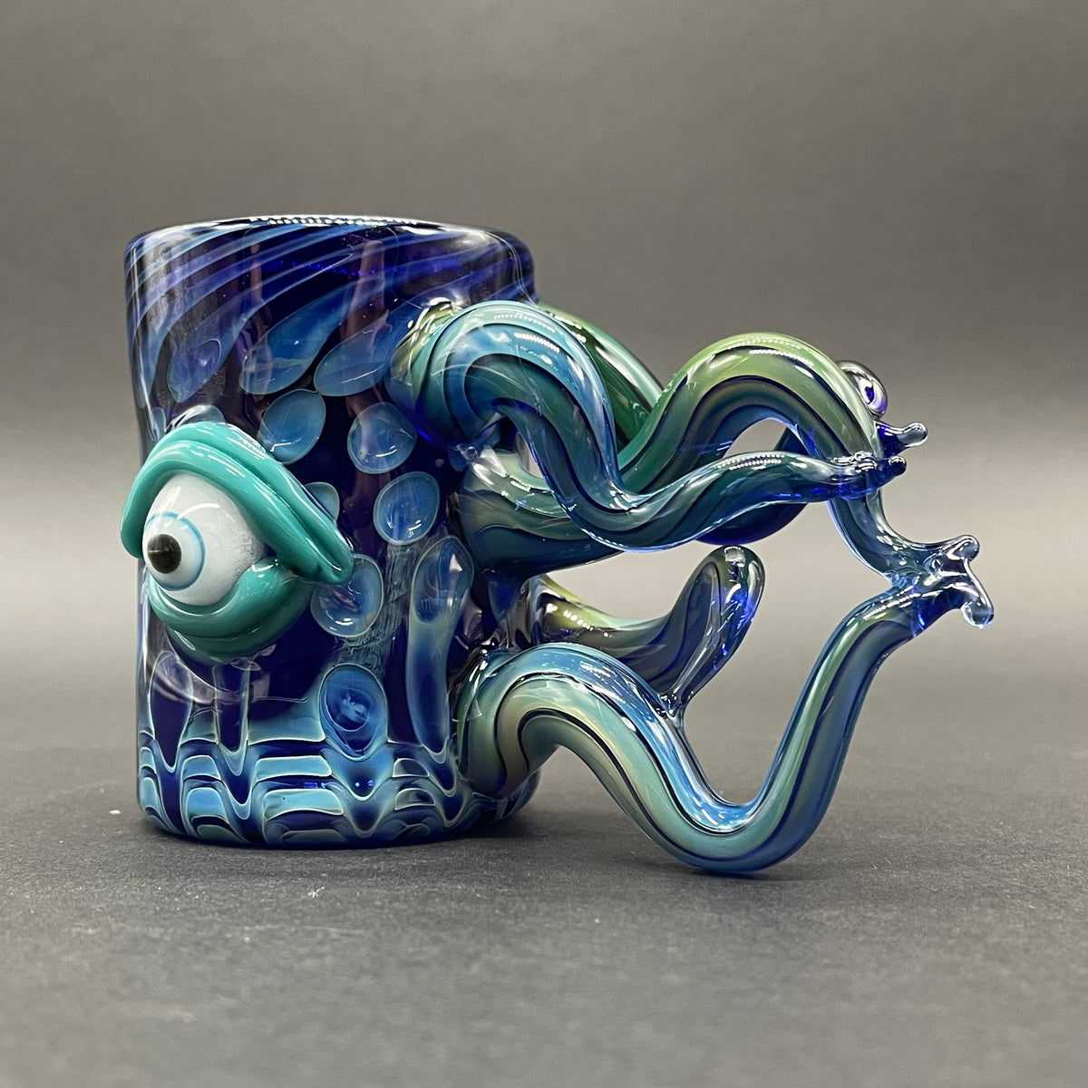 Close-up of Leviathan shot glass - handcrafted glass