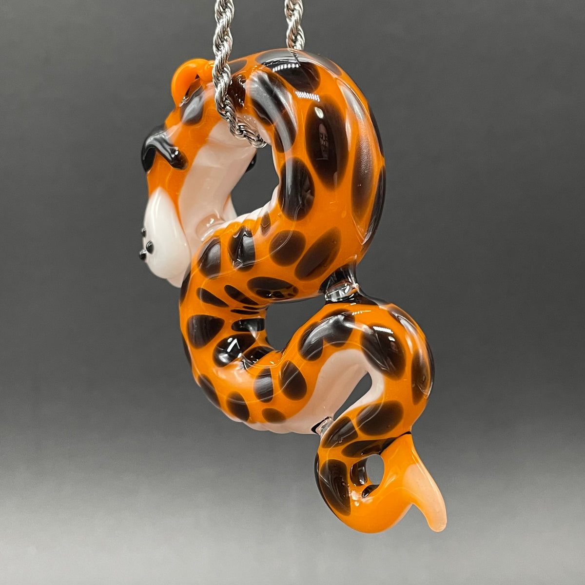 Slithering Chester Cheetah glass pendant by Leviathan Glass - artisan detail