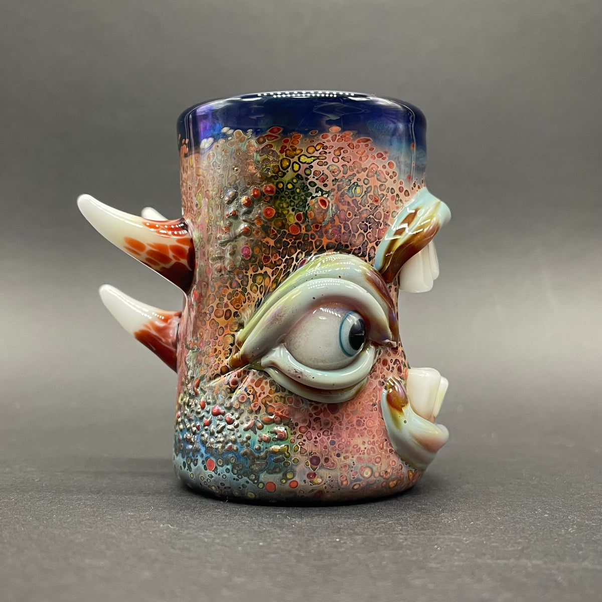 Close-up of Screaming shot glass - handcrafted glass