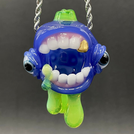 Drippy screamer pendant detail view - premium glass art