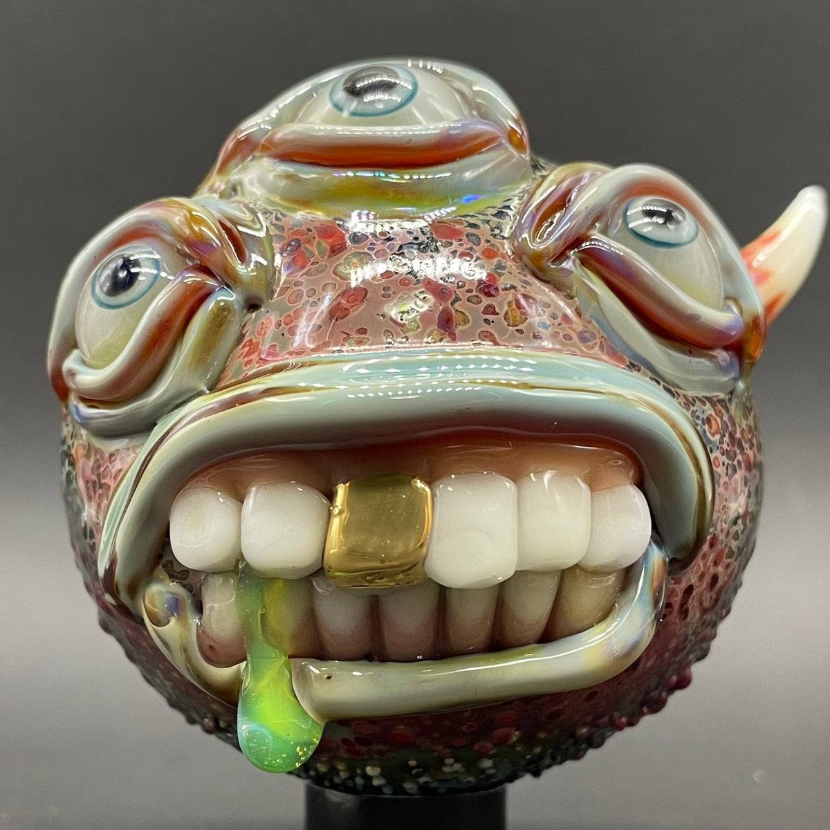 Close-up of Triclops ornament - handcrafted glass