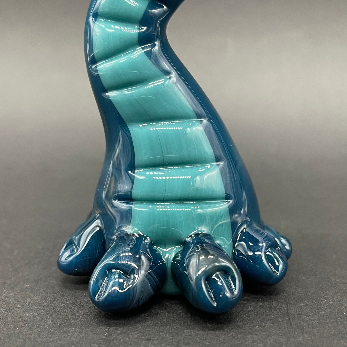 Cyclopsasarus glass pendant