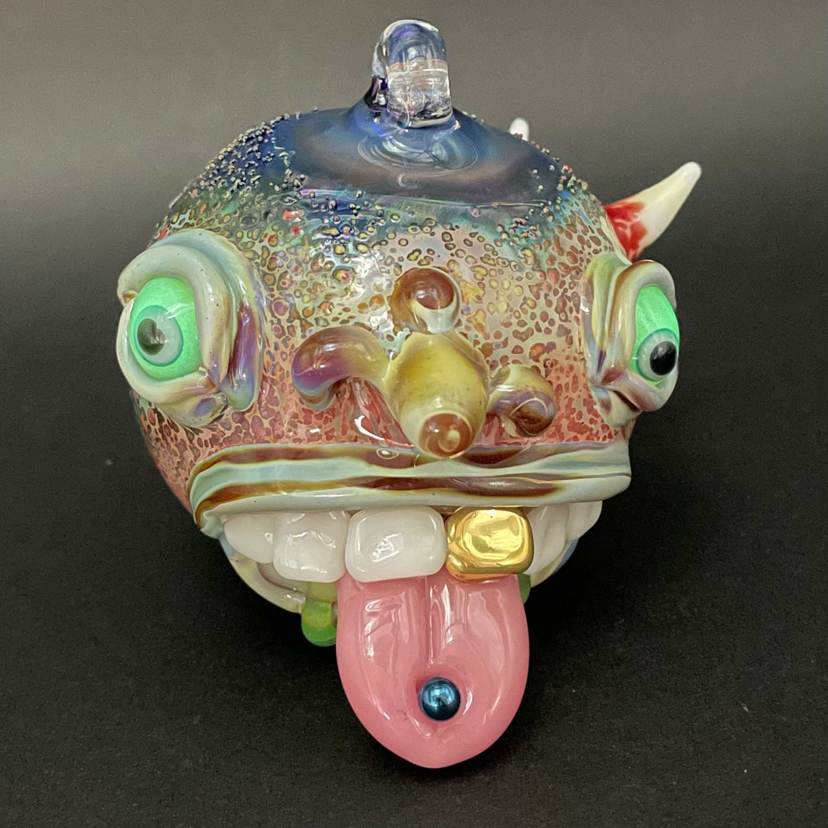 Pierced tongue cyclops ornament by Leviathan Glass - artisan detail