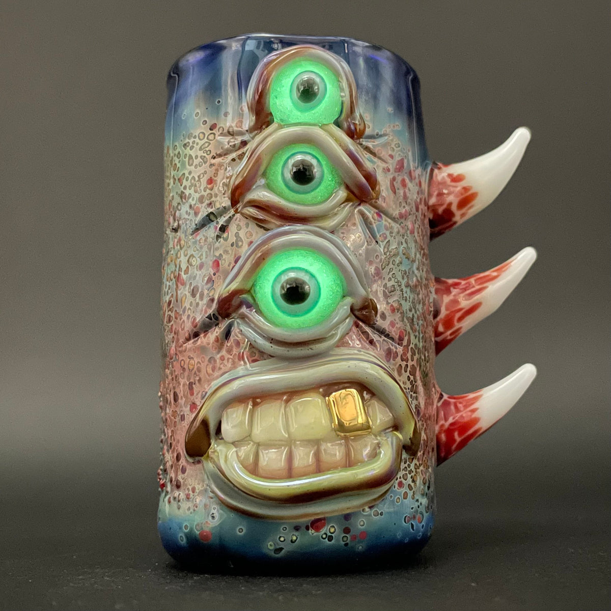 Vertical 3 eye shot glass detail view - premium glass art