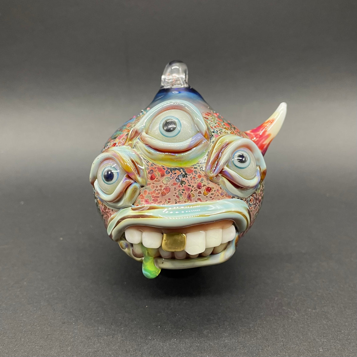 Hand-blown glass Triclops ornament by Leviathan Glass
