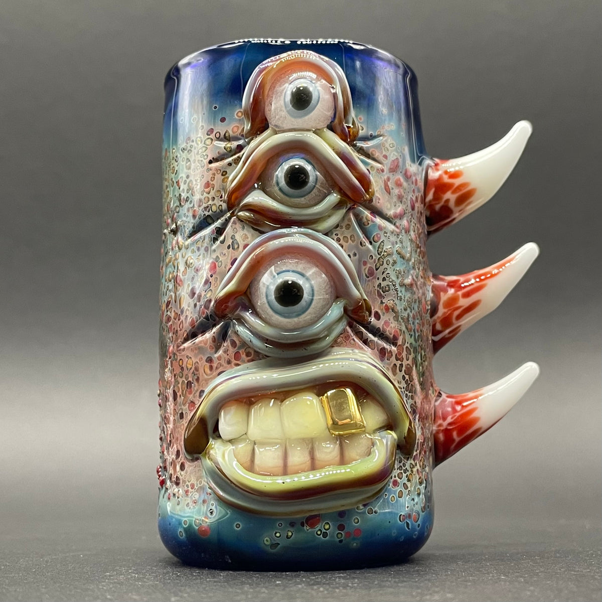 Vertical 3 eye shot glass detail view - premium glass art