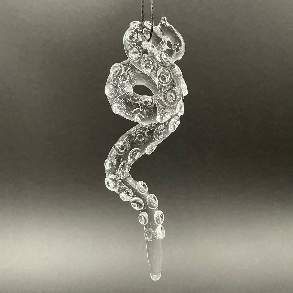 3 clear tentacle ornaments by Leviathan Glass - artisan detail