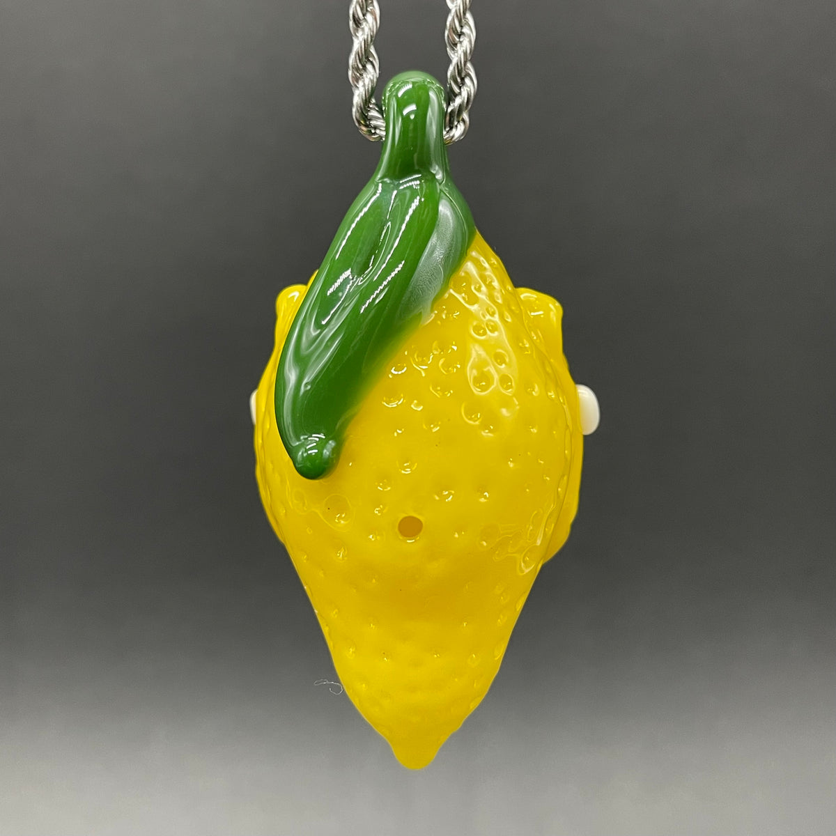 Grinning lemon pendant