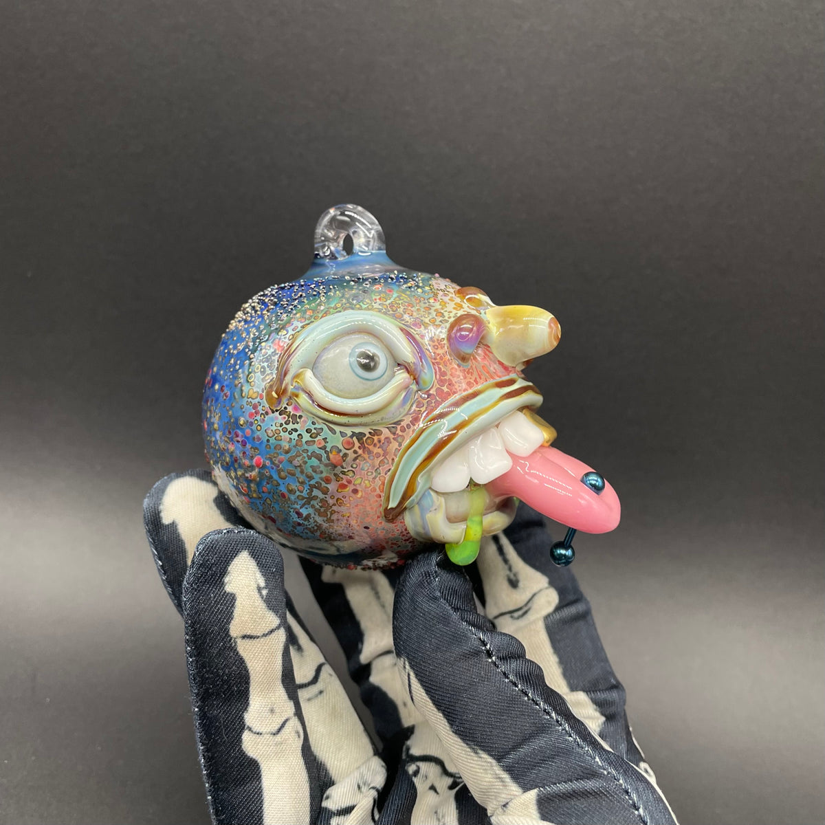 Pierced tongue cyclops ornament craftsmanship - artisan glass work