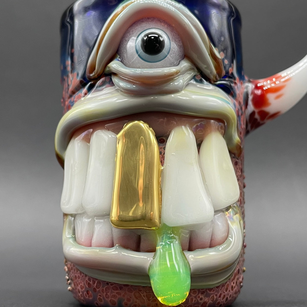 Big tooth Cyclops shot glass hand blown glass art - Leviathan Glass